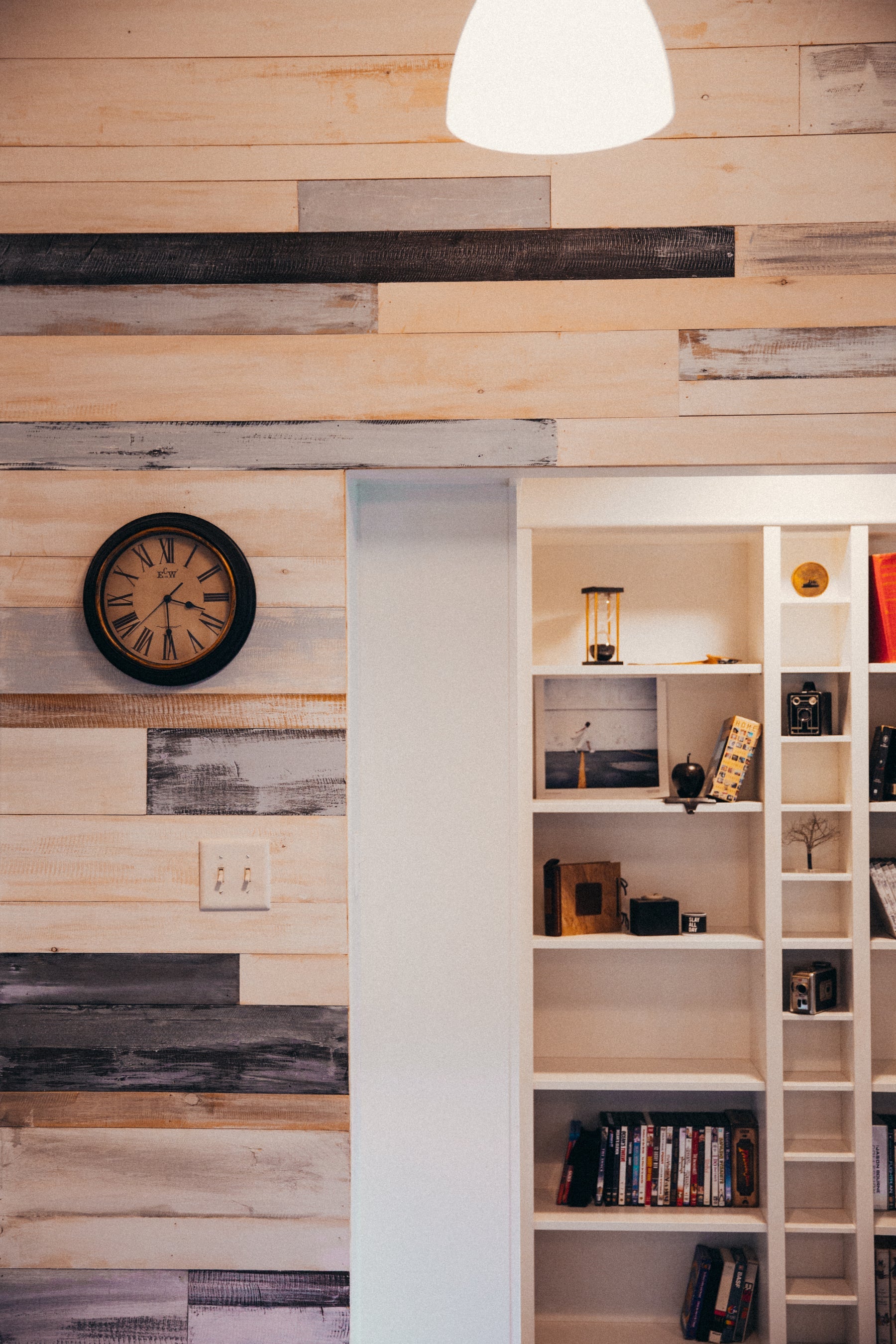 Modern wood panelled wall and shelving interior